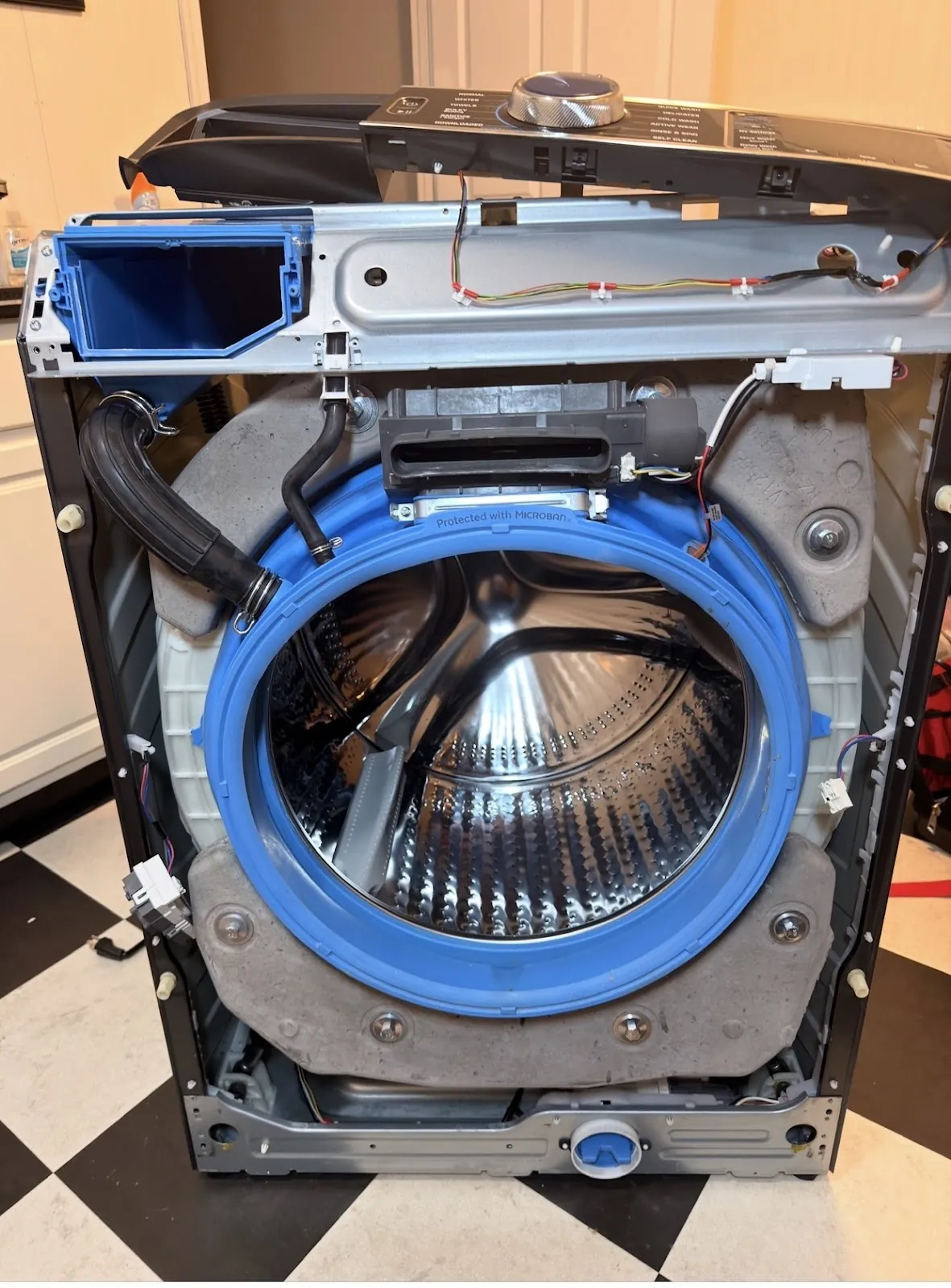 Front-load washer opened up for repair