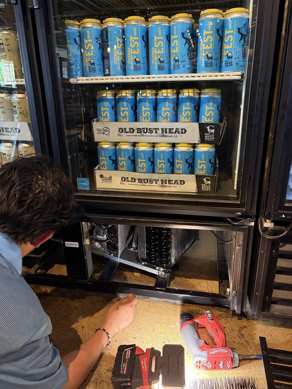 Servicing a commercial refrigerated display cooler